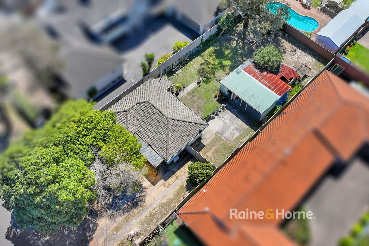 15 McEvoy Ave — photo from Raine & Horne Ettalong Beach | St Huberts Island