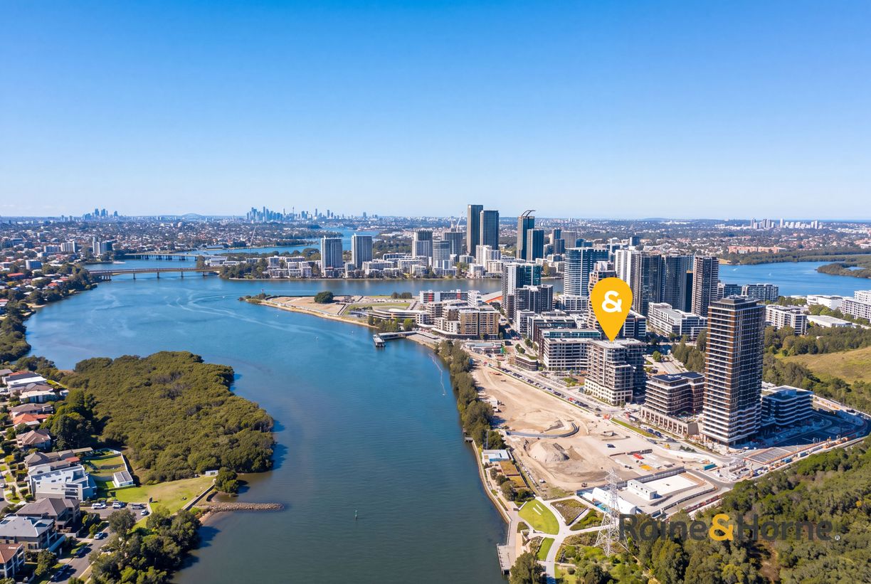 903/8 Sanctuary Boulevard — photo from Raine & Horne Rhodes | Wentworth Point